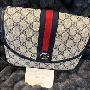 Gucci Beige and Navy Crossbody Bag. Never used in pristine condition.